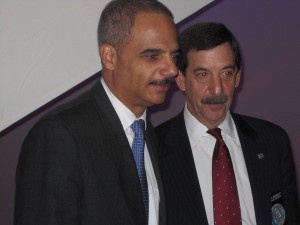 Holder on the left in Denver at the International Chiefs of Police Conference/ticklethewire.com photo 