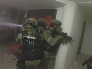 Agents conducting the raid, via Twitter. 