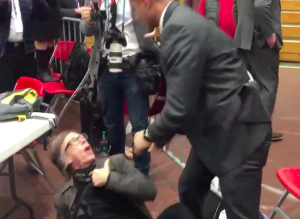 A Time photographer is slammed to the ground by a Secret Service agent at a Donald Trump rally. 