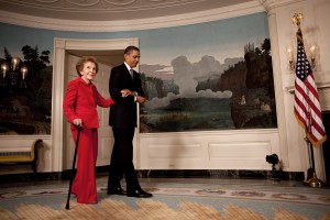 President Barack Obama escorts former First Lady Nancy Reagan in the Diplomatic Room of the White House June 2, 2009.  (Official White House Photo by Lawrence Jackson) This official White House photograph is being made available for publication by news organizations and/or for personal use printing by the subject(s) of the photograph. The photograph may not be manipulated in any way or used in materials, advertisements, products, or promotions that in any way suggest approval or endorsement of the President, the First Family, or the White House.Ê