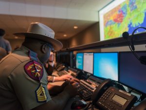 At the Super Bowl command post, a Texas Highway Patrol officer takes part in a “rehearsal of concept” exercise several weeks prior to the command post going operational. 