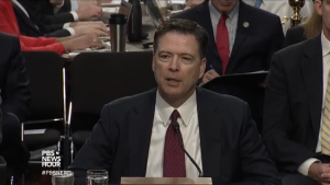 Former FBI Director James Comey testifies about President Trump before the Senate Intelligence Committee in early June. 