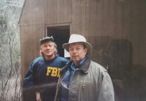 Agents John Steiner and Jerry Webb at Ted's front door. 